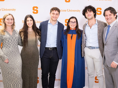 Pictured with their family, Syracuse University Trustee Jeannine Lostritto ’90 and her husband, Glenn, were the first donors to The Syracuse Promise initiative. displayed in a new window
