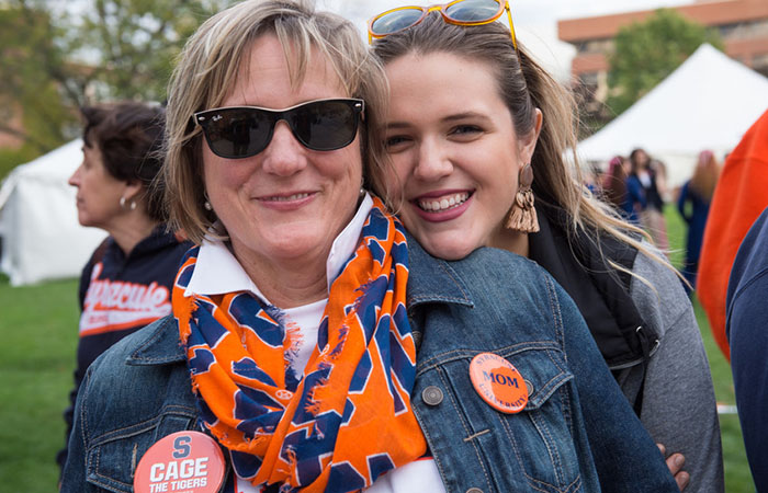 Photo of parent and student during family weekend