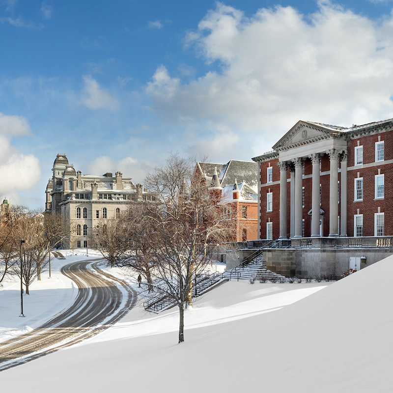 Syracuse Campus in the winter with snow on the ground banner
        				