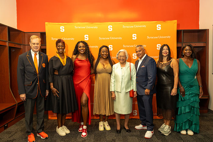 From left to right Chancellor Kent Syverud, Tara Favors, Sade Muhammad ’12 (Young alumni award), JaNeika James G’05, Dr. Ruth Chen, Jason Olivo  displayed in a new window