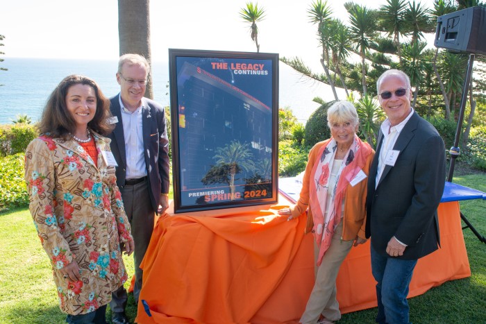 Chancellor Syverud with the Clark family displayed in a new window